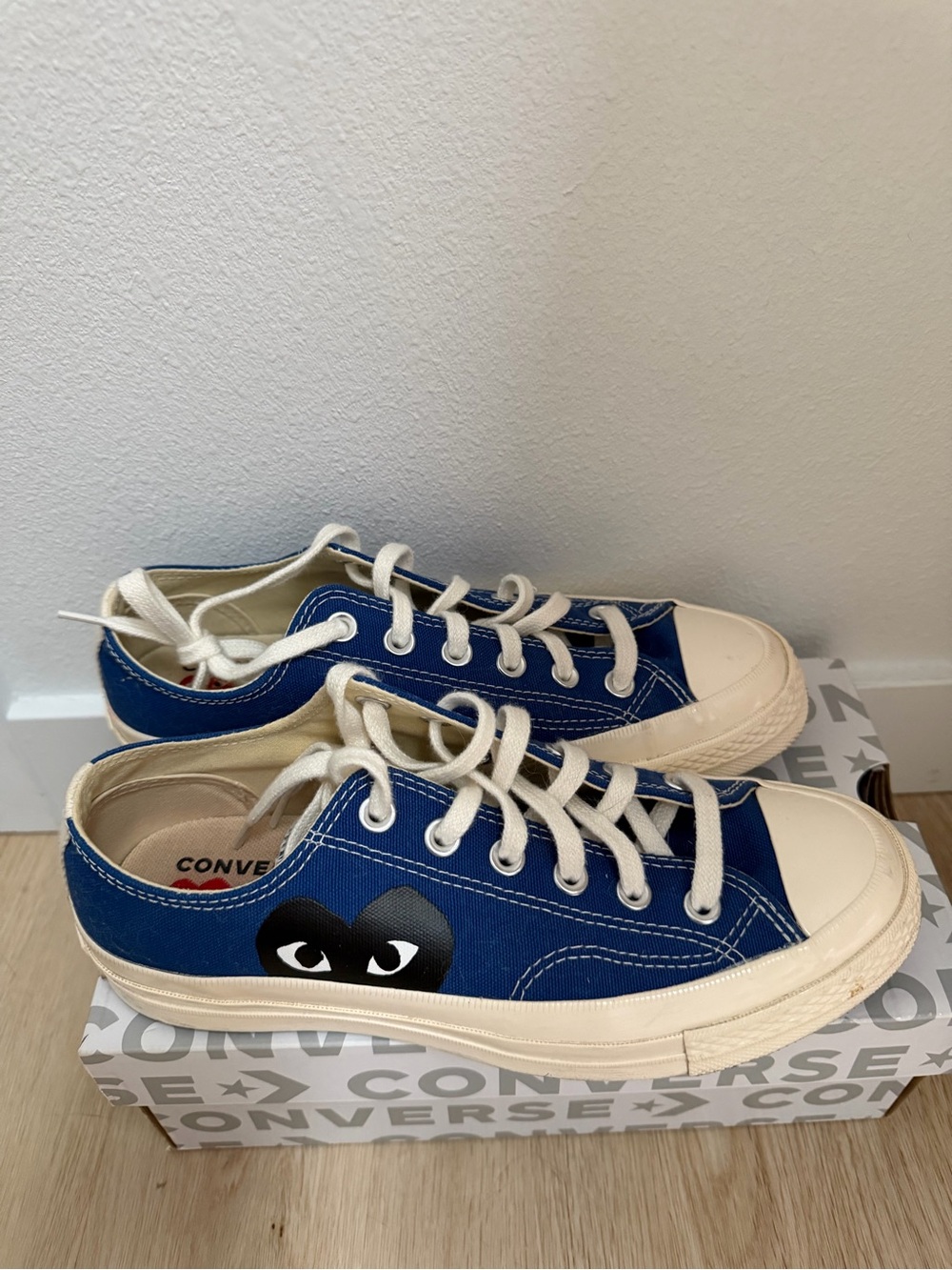 Converse Blue Low-Top Canvas Sneakers with Black Heart Graphic